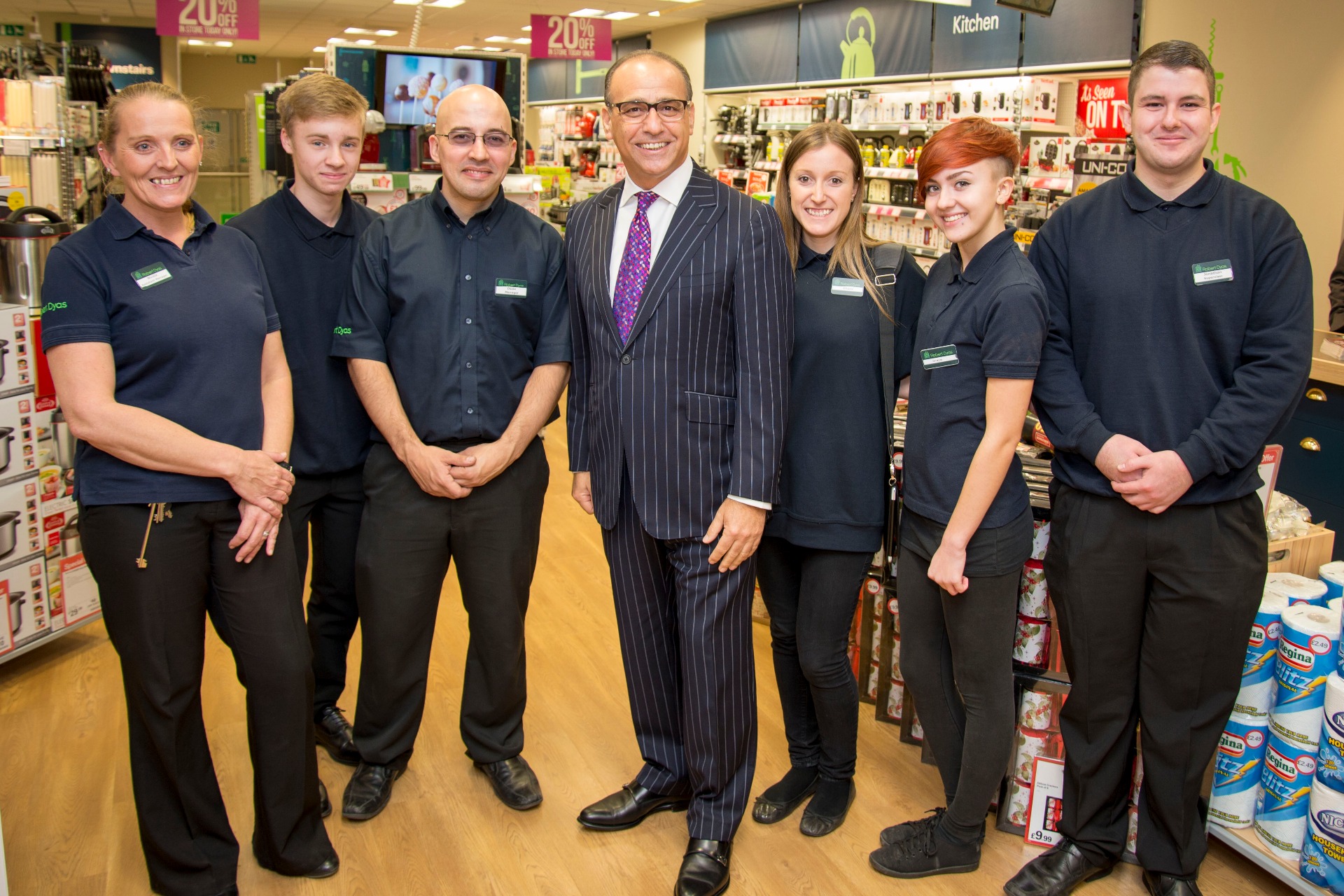 Theo Paphitis with Robert Dyas employees