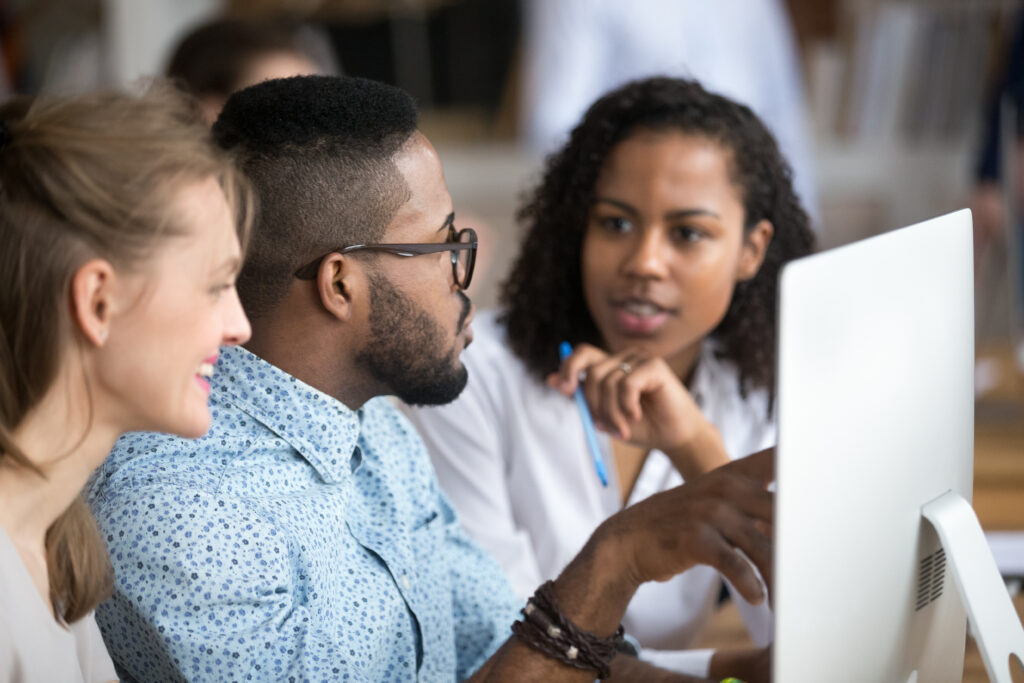 Black african male explains women interns corporate program